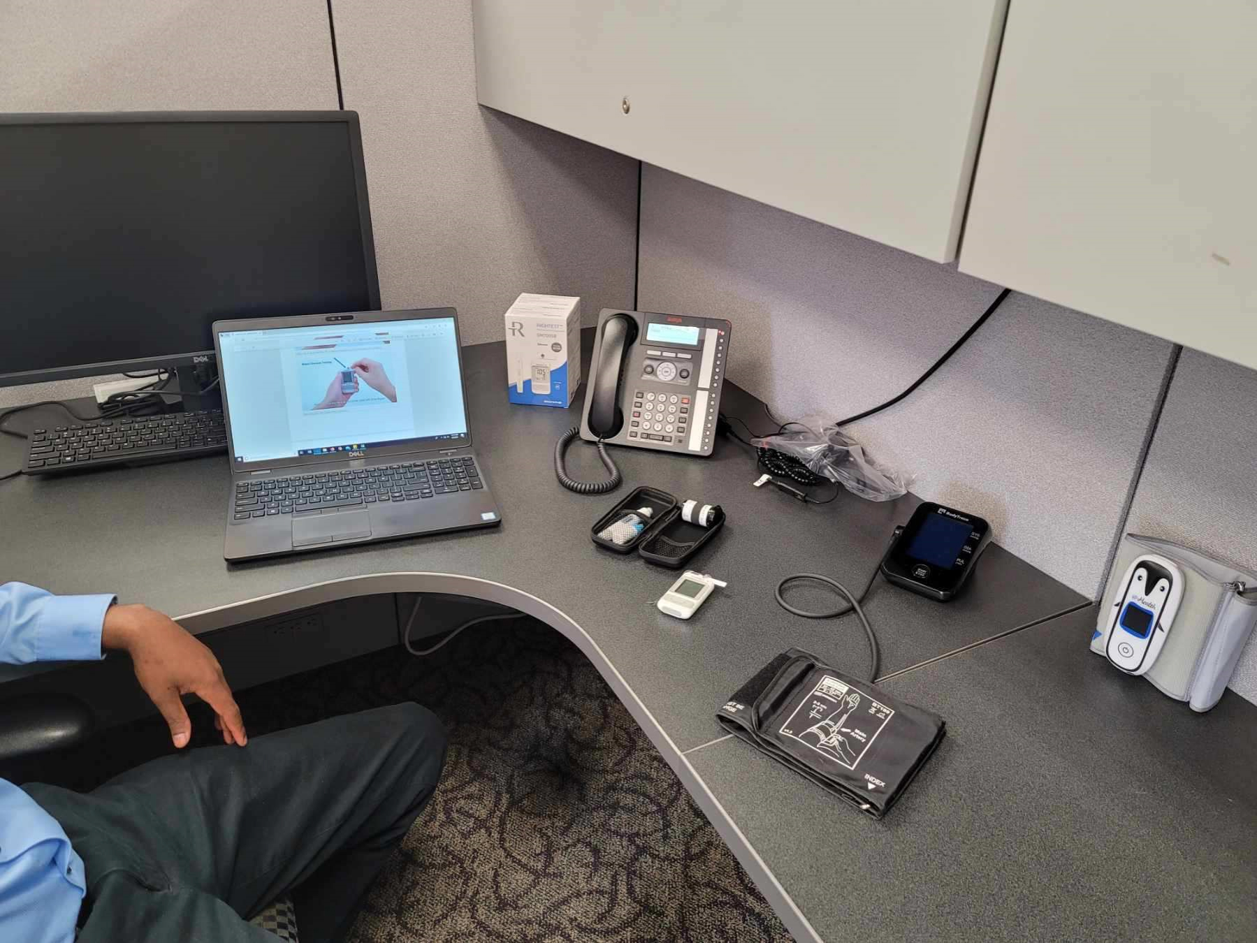 image of a desk with various digital devices set up