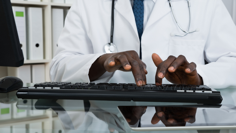 image of doctor typing
